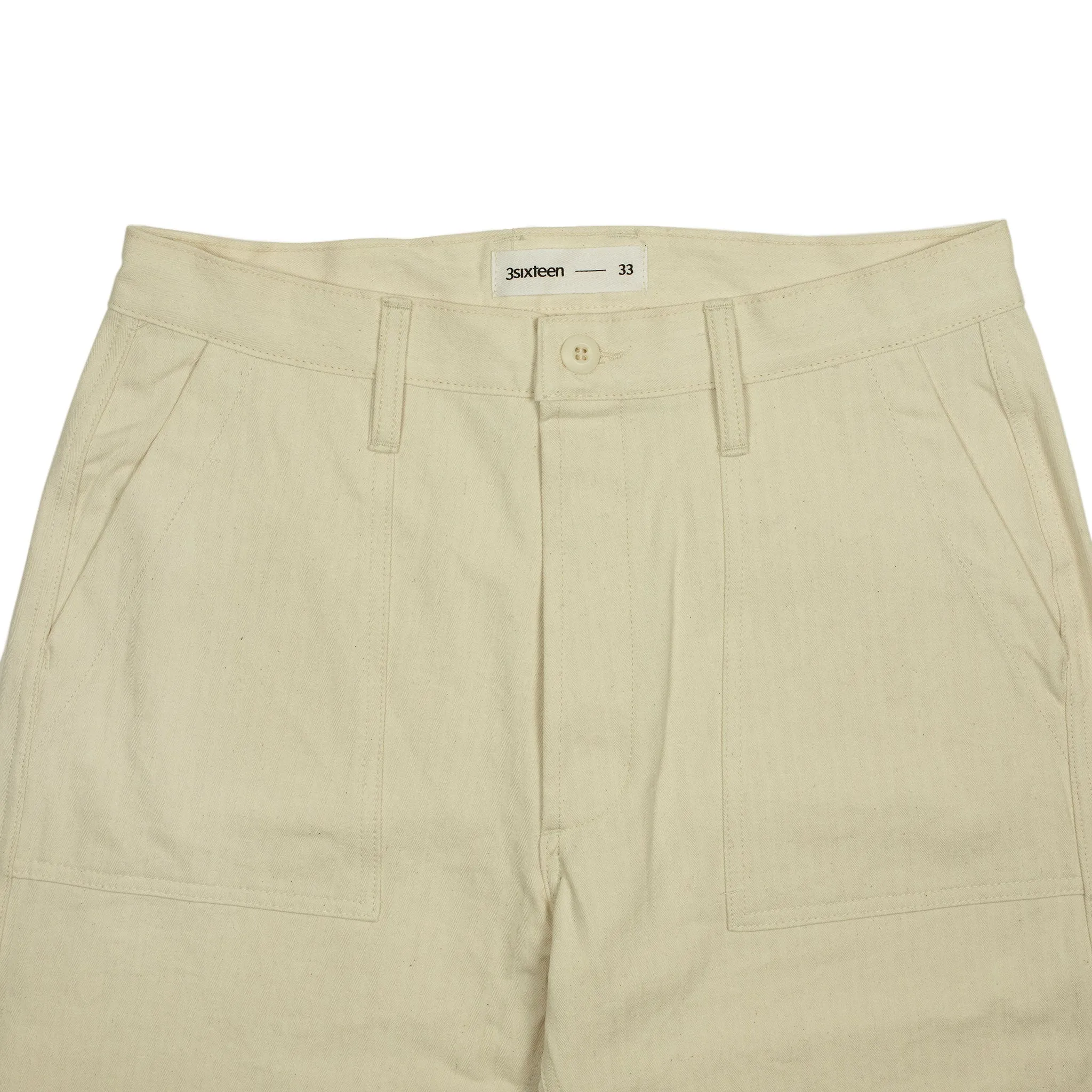 Fatigue pants in washed natural herringbone cotton