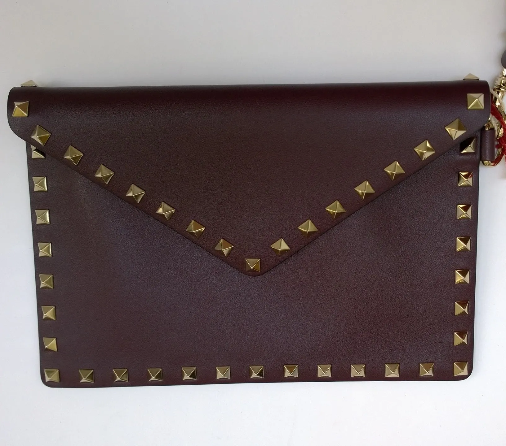 Valentino Garavani V-Flap Oxblood Leather Rockstud Envelope Pouch with Wrist Strap Small